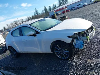2019 Mazda Mazda3 Hatchback with VIN JM1BPBJM6K1124773, listed as a IAAI auction lot 41838263 with 50,702 mi miles. Bid and sale history available at carsss.com. Image 14.