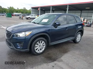 2016 Mazda CX-5 Sport with VIN JM3KE2BY0G0850298, listed as a IAAI auction lot 42107007 with 97,478 mi miles. Bid and sale history available at carsss.com. Image 17.