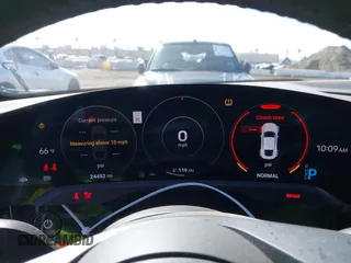 2021 Porsche Taycan 4S z VIN WP0AB2Y12MSA43873, wystawiony jako IAAI lot #41703233 z przebiegiem 24 452 mil mil oraz . Historia ofert i sprzedaży dostępna na DreamBid. Obrazek 7.