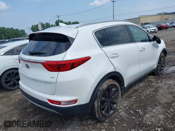 2018 Kia Sportage EX with VIN KNDPNCACXJ7409142, listed as a IAAI auction lot 42665448 with 80,537 mi miles and . Bid and sale history available at DreamBid. Image 4.