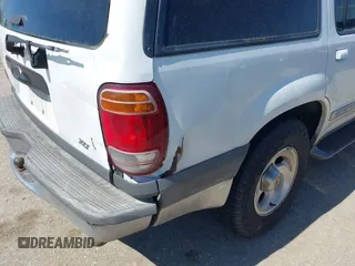 2000 Ford Explorer XLT z VIN 1FMZU63E7YZA06774, wystawiony jako IAAI lot #42240135 z przebiegiem 329 219 mil mil oraz . Historia ofert i sprzedaży dostępna na DreamBid. Obrazek 12.