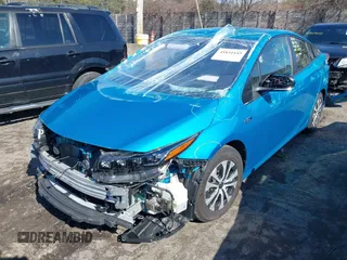 2021 Toyota Prius LE with VIN JTDKAMFP1M3166050, listed as a IAAI auction lot 41831145 with 54,350 mi miles and . Bid and sale history available at DreamBid. Image 18.