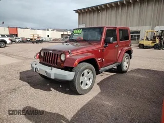 2008 Jeep Wrangler Sahara with VIN 1J4FA54118L537472, listed as a Copart auction lot 57785185 with 121,029 mi miles and Clean title. Bid and sale history available at DreamBid. Image 2.