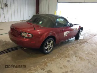 2007 Mazda MX-5 Miata Sport z VIN JM1NC25F970132299, wystawiony jako IAAI lot #41622791 z przebiegiem 72 392 mil mil oraz . Historia ofert i sprzedaży dostępna na DreamBid. Obrazek 4.