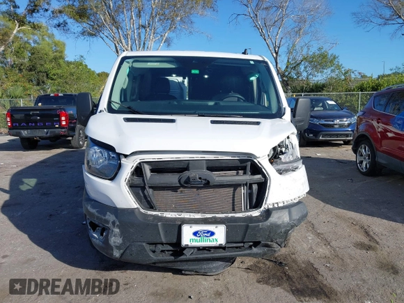 2023 Ford Transit Cargo with VIN 1FTBR1Y81PKB93787, listed as a IAAI auction lot 41253973 with 16,058 mi miles and . Bid and sale history available at DreamBid. Image 13.