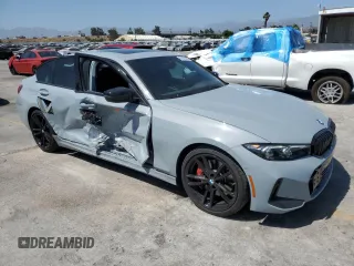 2023 BMW 3 Series 330i with VIN 3MW69FF00P8D52700, listed as a Copart auction lot 61629485 with 12,007 mi miles and Salvage title. Bid and sale history available at DreamBid. Image 4.