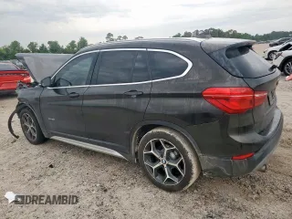 2017 BMW X1 xDrive28i z VIN WBXHT3C35H5F71683, wystawiony jako Copart lot #57761785 z przebiegiem 78 220 mil mil oraz Tytuł czysty. Historia ofert i sprzedaży dostępna na DreamBid. Obrazek 2.