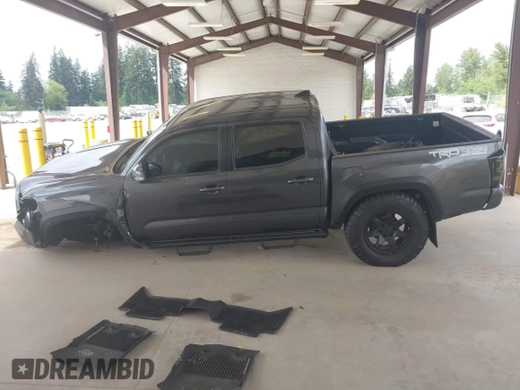 2019 Toyota Tacoma SR z VIN 3TMCZ5AN1KM257081, wystawiony jako IAAI lot #42211385 z przebiegiem 60 229 mil mil oraz . Historia ofert i sprzedaży dostępna na DreamBid. Obrazek 15.
