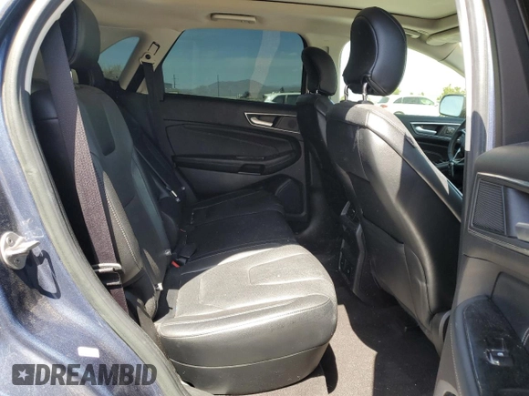 2019 Ford Edge Titanium z VIN 2FMPK4K91KBB81098, wystawiony jako Copart lot #53604115 z przebiegiem 70 179 mil mil oraz Szkoda całkowita • Salvage title. Historia ofert i sprzedaży dostępna na DreamBid. Obrazek 11.