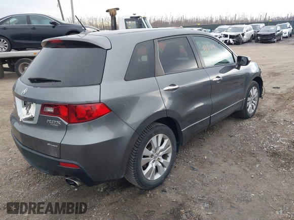 2010 Acura RDX with VIN 5J8TB1H21AA008236, listed as a IAAI auction lot 41664609 with 136,394 mi miles. Bid and sale history available at carsss.com. Image 4.