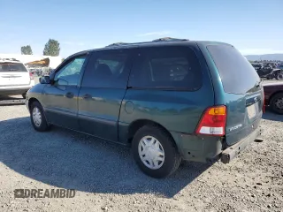 2000 Ford Windstar LX with VIN 2FMZA5149YBC10637, listed as a Copart auction lot 74140104 with 105,704 mi miles and Salvage Title. Bid and sale history available at carsss.com. Image 2.