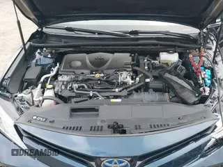 2020 Toyota Camry Hybrid XLE z VIN 4T1F31AK7LU521801, wystawiony jako IAAI lot #42707425 z przebiegiem 66 573 mil mil oraz . Historia ofert i sprzedaży dostępna na DreamBid. Obrazek 19.