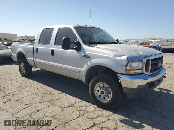 2002 Ford F-250 XL with VIN 1FTNW21L92ED10310, listed as a Copart auction lot 59132935 with 217,885 mi miles and Salvage title. Bid and sale history available at DreamBid. Image 4.