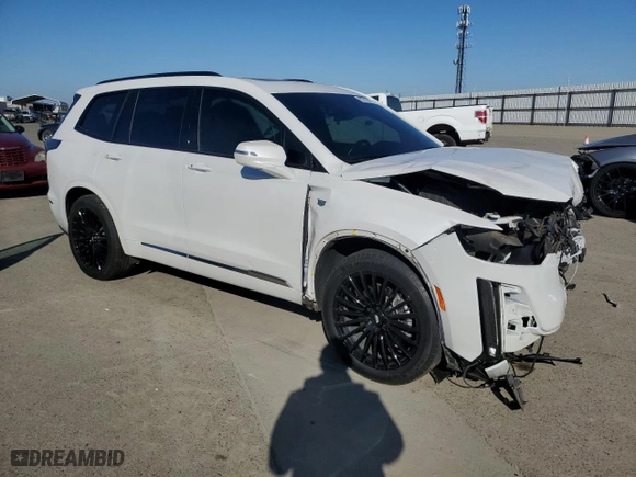 2021 Cadillac XT6 Sport with VIN 1GYKPGRS2MZ175735, listed as a Copart auction lot 88703045 with 26,902 mi miles and Salvage Title. Bid and sale history available at carsss.com. Image 4.