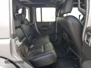 2021 Jeep Wrangler Unlimited Sahara High Altitude с VIN 1C4HJXEG2MW620527, выставлен на аукционе Copart как лот 72848894 с пробегом 65 598 миль миль и Списание • Salvage title. История ставок и продаж доступна на DreamBid. Изображение 11.