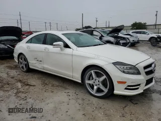2014 Mercedes-Benz CLS-Class CLS 550 with VIN WDDLJ9BB6EA100978, listed as a Copart auction lot 70038044 with 126,179 mi miles and Salvage Title. Bid and sale history available at carsss.com. Image 4.