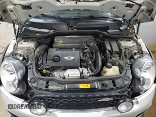2013 MINI Convertible S z VIN WMWZP3C50DT550943, wystawiony jako Copart lot #62070255 z przebiegiem 63 122 mil mil oraz Szkoda całkowita • Salvage title. Historia ofert i sprzedaży dostępna na DreamBid. Obrazek 11.