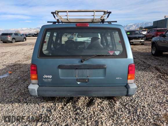 1999 Jeep Cherokee SE with VIN 1J4FF28S5XL646812, listed as a Copart auction lot 87951115 with 230,161 mi miles and Clean title. Bid and sale history available at DreamBid. Image 6.
