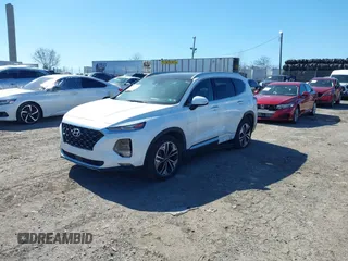 2019 Hyundai Santa Fe Ultimate with VIN 5NMS5CAA0KH067753, listed as a IAAI auction lot 41884396 with 31,343 mi miles and . Bid and sale history available at DreamBid. Image 17.