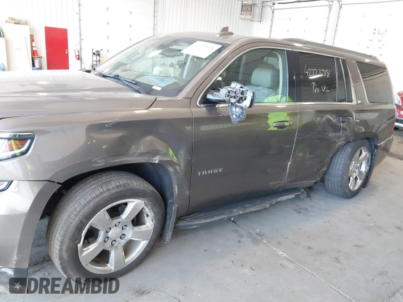 2016 Chevrolet Tahoe LT with VIN 1GNSKBKC9GR172076, listed as a IAAI auction lot 42223918 with 92,348 mi miles and . Bid and sale history available at DreamBid. Image 6.