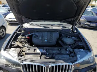 2015 BMW X3 xDrive28d with VIN 5UXWY3C55F0F83896, listed as a Copart auction lot 70690134 with 119,581 mi miles and Salvage Title. Bid and sale history available at carsss.com. Image 12.