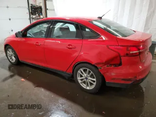 2015 Ford Focus SE with VIN 1FADP3F20FL205273, listed as a Copart auction lot 58627814 with 198,266 mi miles and Salvage title. Bid and sale history available at DreamBid. Image 2.