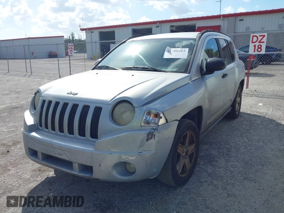 2007 Jeep Compass Sport with VIN 1J8FT47W57D185807, listed as a IAAI auction lot 41700283 with 194,339 mi miles. Bid and sale history available at carsss.com. Image 6.