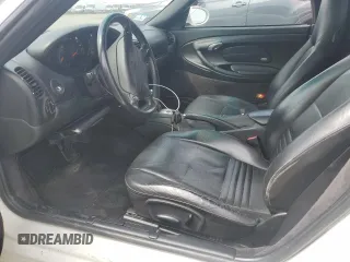 2000 Porsche Boxster z VIN WP0CA2983YU620313, wystawiony jako Copart lot #54605995 z przebiegiem 134 807 mil mil oraz Tytuł czysty. Historia ofert i sprzedaży dostępna na DreamBid. Obrazek 7.