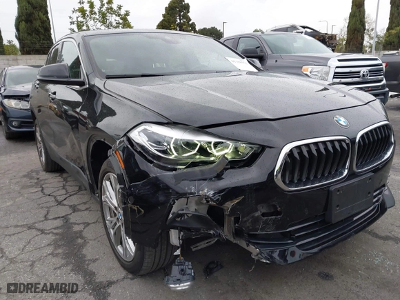 2020 BMW X2 sDrive28i with VIN WBXYH9C08L5R62746, listed as a IAAI auction lot 41788571 with 20,981 mi miles. Bid and sale history available at carsss.com. Image 6.