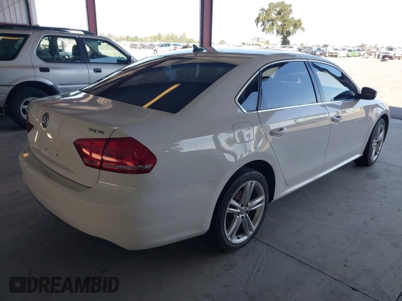 2014 Volkswagen Passat SE с VIN 1VWBN7A3XEC087730, выставлен на аукционе IAAI как лот 42374482 с пробегом 199 449 миль миль и . История ставок и продаж доступна на DreamBid. Изображение 4.