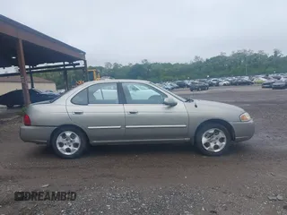 2004 Nissan Sentra S z VIN 3N1CB51D74L481186, wystawiony jako IAAI lot #42381604 z przebiegiem 141 614 mil mil oraz . Historia ofert i sprzedaży dostępna na DreamBid. Obrazek 13.