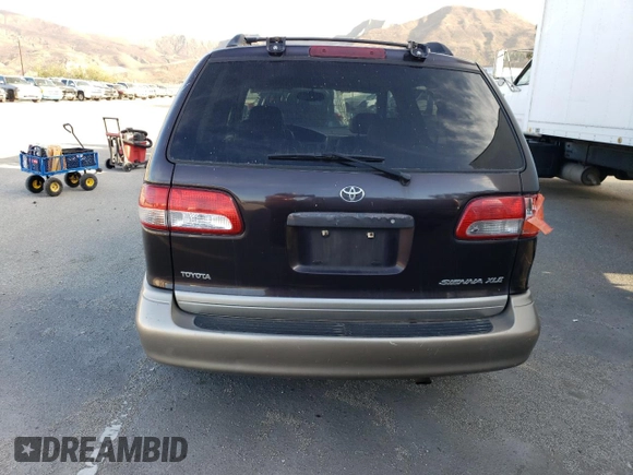 2002 Toyota Sienna LE with VIN 4T3ZF13CX2U457768, listed as a Copart auction lot 84763284 with 195,268 mi miles and Salvage Title. Bid and sale history available at DreamBid. Image 6.