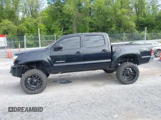 2007 Toyota Tacoma PreRunner z VIN 5TEJU62NX7Z338052, wystawiony jako IAAI lot #42204246 z przebiegiem 202 296 mil mil oraz . Historia ofert i sprzedaży dostępna na DreamBid. Obrazek 14.