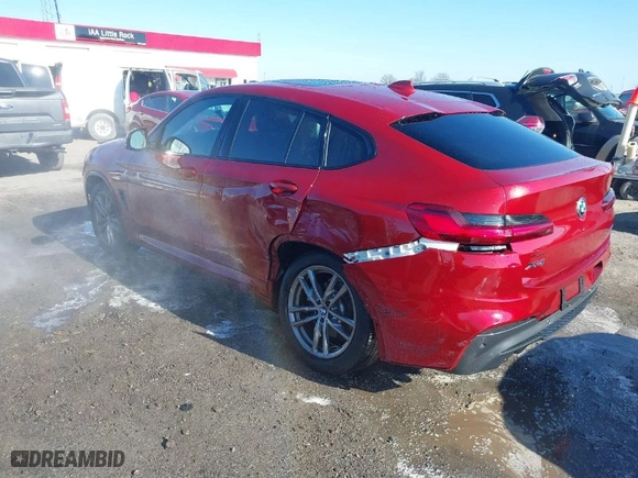 2021 BMW X4 xDrive30i with VIN 5UX2V1C0XM9H70348, listed as a IAAI auction lot 41209981 with 45,706 mi miles. Bid and sale history available at carsss.com. Image 3.
