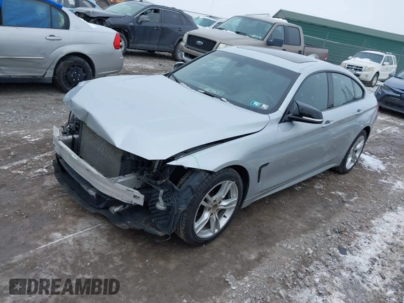 2016 BMW 4 Series 428i xDrive with VIN WBA4C9C53GG136870, listed as a IAAI auction lot 41410071 with 116,187 mi miles and . Bid and sale history available at DreamBid. Image 18.