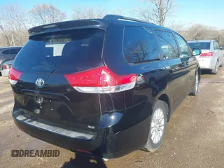2011 Toyota Sienna XLE AAS with VIN 5TDYK3DC0BS030313, listed as a IAAI auction lot 41783766 with 267,937 mi miles. Bid and sale history available at carsss.com. Image 4.