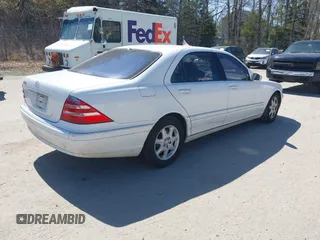 2001 Mercedes-Benz S with VIN WDBNG70J81A166750, listed as a IAAI auction lot 42168436 with 149,258 mi miles. Bid and sale history available at carsss.com. Image 4.