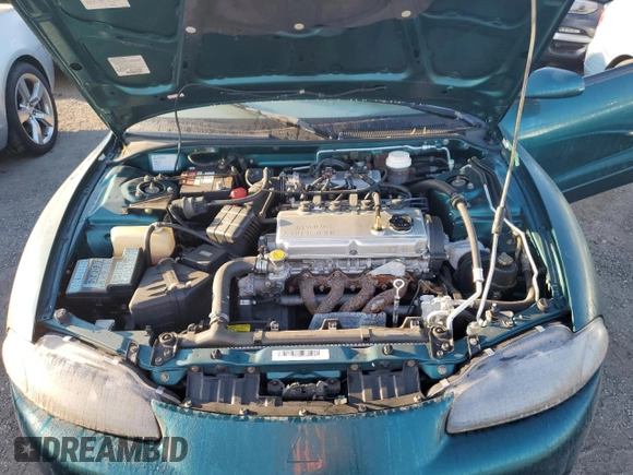 1999 Mitsubishi Eclipse GS with VIN 4A3AX35G2XE134039, listed as a Copart auction lot 76186224 with 0 mi miles and Salvage Title. Bid and sale history available at carsss.com. Image 11.