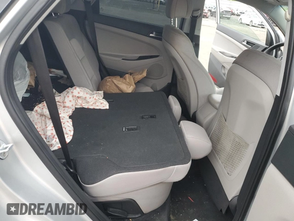 2018 Hyundai Tucson SEL z VIN KM8J3CA43JU645083, wystawiony jako Copart lot #50911035 z przebiegiem 68 777 mil mil oraz Szkoda całkowita • Salvage title. Historia ofert i sprzedaży dostępna na DreamBid. Obrazek 11.