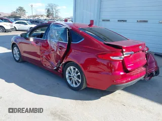 2019 Ford Fusion SE with VIN 3FA6P0HD4KR132068, listed as a IAAI auction lot 41869570 with 86,660 mi miles and . Bid and sale history available at DreamBid. Image 3.