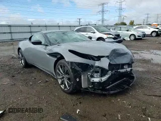 2019 Aston Martin DB11 V8 z VIN SCFRMFAW0KGL06287, wystawiony jako Copart lot #62828302 z przebiegiem Nie podano mil oraz . Historia ofert i sprzedaży dostępna na DreamBid. Obrazek 11.