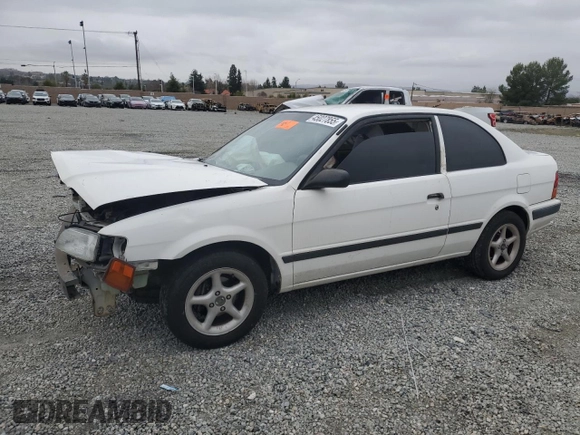 1996 Toyota Tercel DX z VIN JT2AC52L5T0145290, wystawiony jako Copart lot #45027855 z przebiegiem 186 673 mil mil oraz Szkoda całkowita • Salvage title. Historia ofert i sprzedaży dostępna na DreamBid. Obrazek 1.