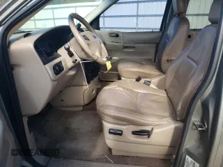 2002 Ford Windstar SE with VIN 2FMZA52462BA09199, listed as a Copart auction lot 83097064 with 216,158 mi miles and Salvage title. Bid and sale history available at DreamBid. Image 7.