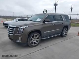 2015 Cadillac Escalade Luxury with VIN 1GYS3MKJ9FR725818, listed as a IAAI auction lot 41596731 with 224,246 mi miles. Bid and sale history available at carsss.com. Image 2.
