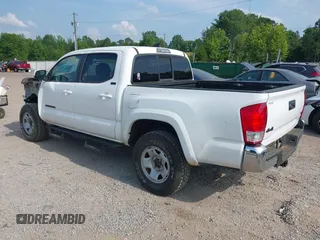 2017 Toyota Tacoma SR5 with VIN 3TMCZ5AN1HM063580, listed as a IAAI auction lot 42421660 with 95,543 mi miles and . Bid and sale history available at DreamBid. Image 3.