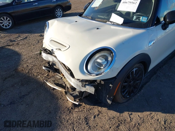 2020 MINI Hardtop Cooper S z VIN WMWXR5C00L2L49498, wystawiony jako IAAI lot #40679562 z przebiegiem 48 387 mil mil oraz . Historia ofert i sprzedaży dostępna na DreamBid. Obrazek 6.