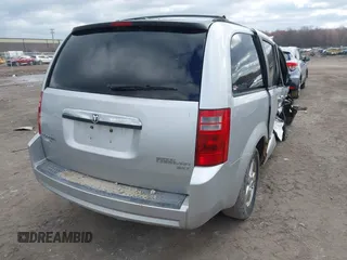 2010 Dodge Grand Caravan SXT with VIN 2D4RN5D13AR180609, listed as a IAAI auction lot 41857215 with Not Provided miles and . Bid and sale history available at DreamBid. Image 4.
