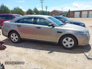 2016 Ford Police Interceptor z VIN 1FAHP2MKXGG116013, wystawiony jako IAAI lot #42237717 z przebiegiem 104 137 mil mil oraz . Historia ofert i sprzedaży dostępna na DreamBid. Obrazek 13.