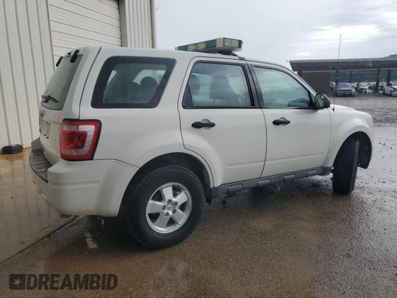 2011 Ford Escape XLS with VIN 1FMCU0C74BKC27897, listed as a Copart auction lot 63084415 with 116,423 mi miles and Clean title. Bid and sale history available at DreamBid. Image 3.