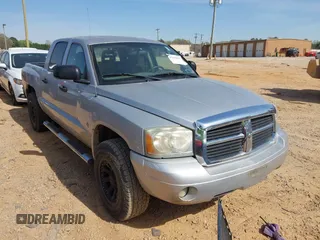2007 Dodge Dakota SLT z VIN 1D7HW48N37S118556, wystawiony jako IAAI lot #41858854 z przebiegiem 155 038 mil mil oraz . Historia ofert i sprzedaży dostępna na DreamBid. Obrazek 1.